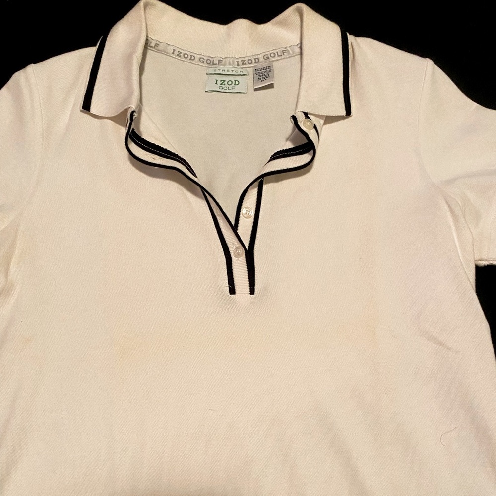 White golf shirt, black lining